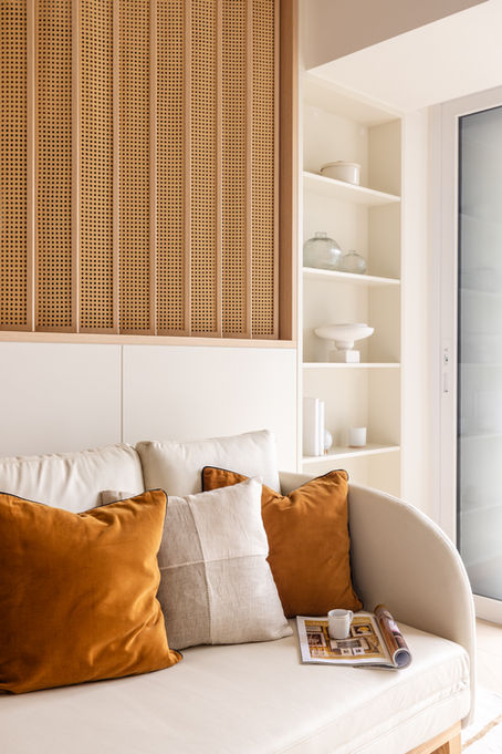 Modern living room interior design by MAD Studio featuring minimalist wooden shelving and contemporary decor. Stylish home decor ideas, elegant partition design, and luxury interior trends.