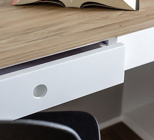 Children's bedroom, plastic laminate table top in timber pattern, recessed handle in custom shape, white drawers, study desk with wooden plastic laminate finish,